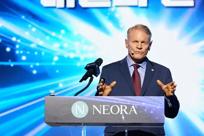 Neora Founder & CEO Jeff Olson delivering a speech at the ASTRA event in Seoul, Korea, discussing the strategic merger with ACN Korea and the company's expansion in the Asia-Pacific region