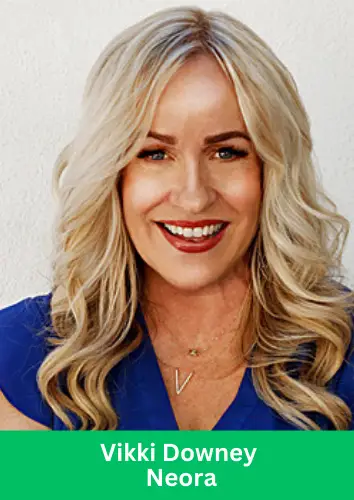 Vikki Downey, a successful Neora distributor, smiling in a professional headshot.