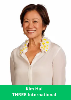 Kim Hui, Gold Diamond Brand Ambassador at THREE International, smiling in a white blouse