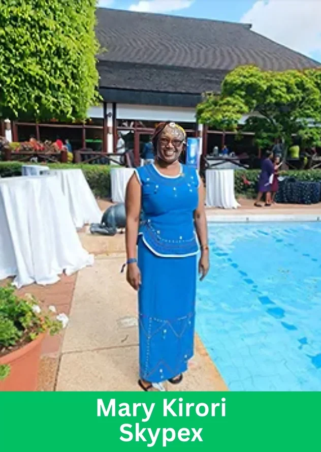 Mary Kirori standing by the poolside, representing Skypex network marketing leadership.