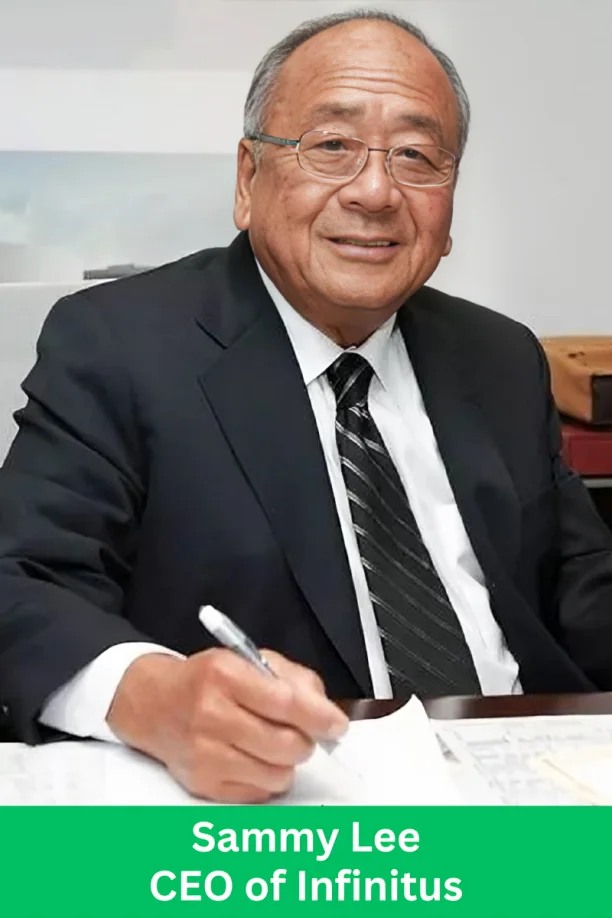 Corporate executive sitting at a desk and signing documents