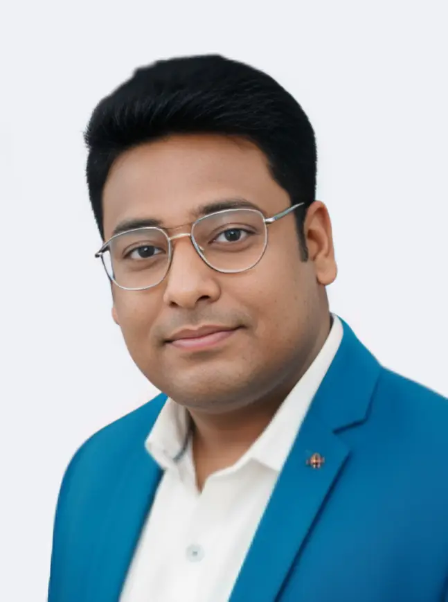 Professional portrait of Ricky Roy representing MetaWealth in a blue suit