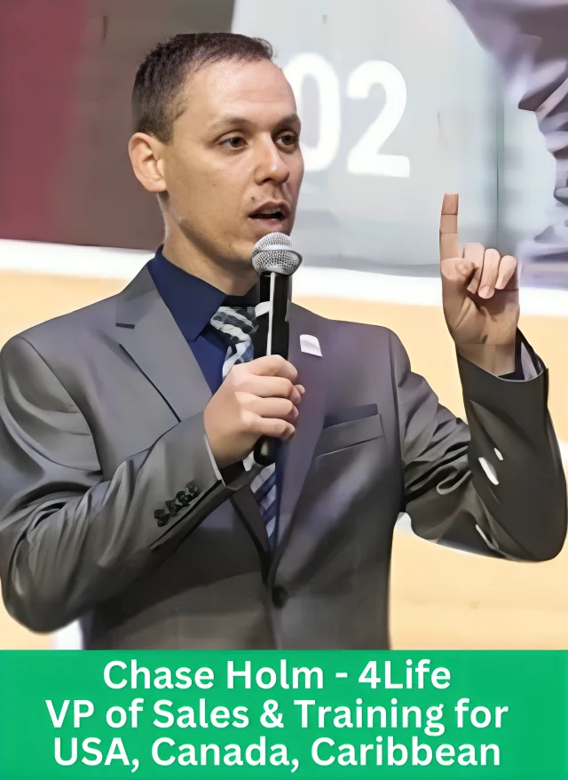 Chase Holm speaking on stage as the 4Life Vice President of Sales and Training for the USA, Canada, and Caribbean regions.