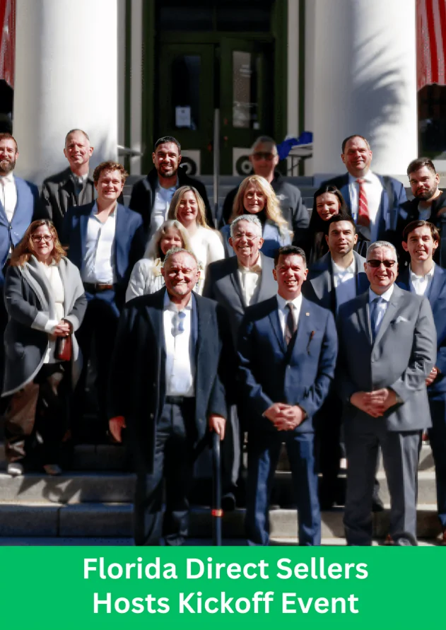Group of Florida direct sellers attending a kickoff event, posing outside a government building during an industry gathering.