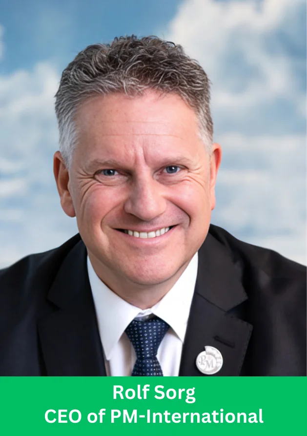 Rolf Sorg CEO of PM-International smiling in a professional corporate portrait