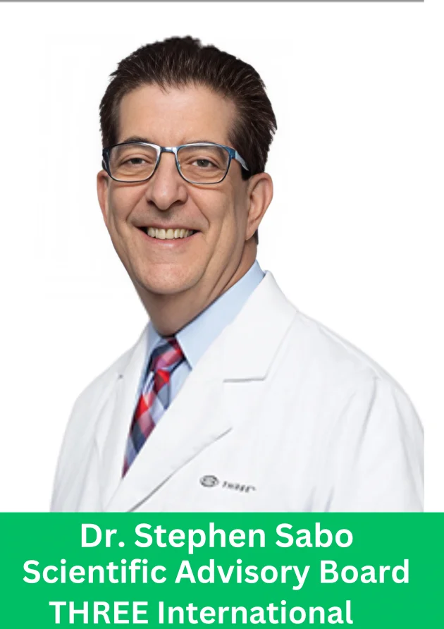 Dr Stephen Sabo, Scientific Advisory Board member at THREE International, wearing a white lab coat and glasses
