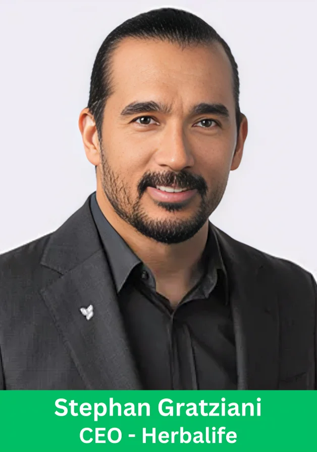 Professional headshot of Stephan Gratziani, CEO of Herbalife, wearing a black suit