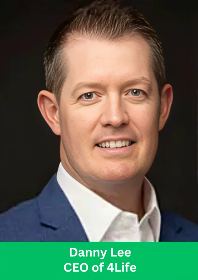 A high-quality executive headshot of Danny Lee, the CEO of 4Life Research, smiling in a tailored blue blazer and white shirt against a dark background, with a green overlay banner at the bottom displaying his name and title.