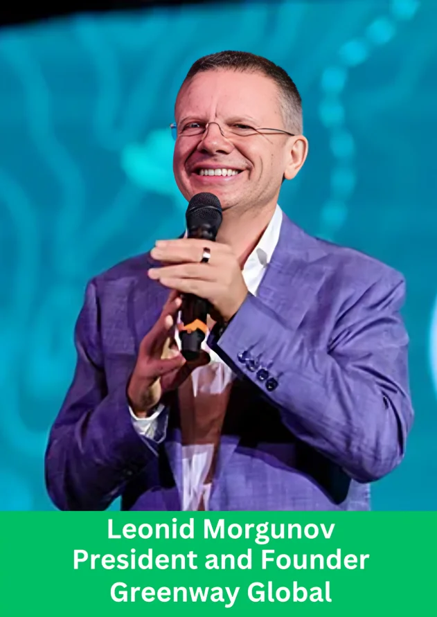 Leonid Morgunov President and Founder of Greenway Global speaking on stage with microphone