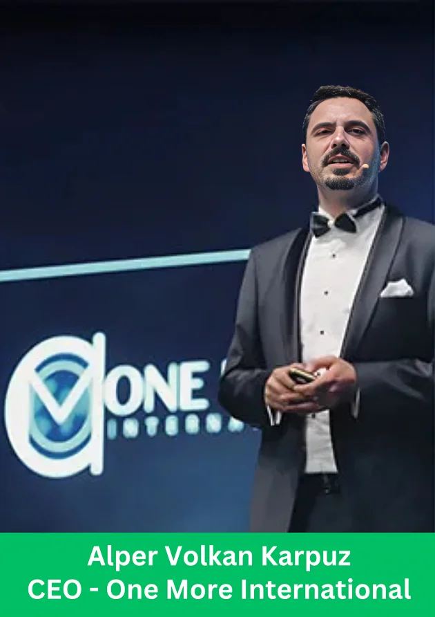 Alper Volkan Karpuz giving presentation as CEO of One More International on stage with company logo in background