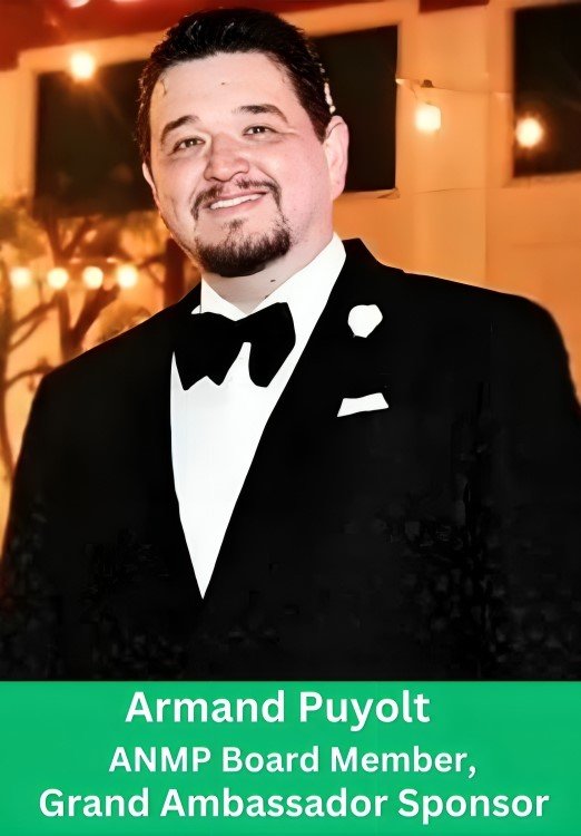 Professional portrait of Armand Puyolt, ANMP Board Member and Grand Ambassador Sponsor, wearing a black tuxedo and bow tie.