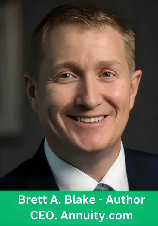Brett A. Blake, a smiling man with light brown hair wearing a dark blue suit and white shirt, Author and CEO of Annuity.com, in a professional portrait.