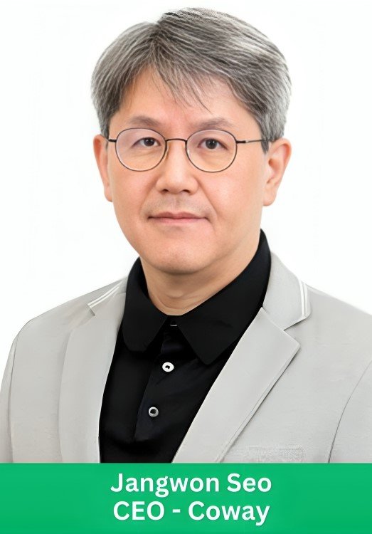 Professional headshot of Jangwon Seo, CEO of Coway, wearing glasses and a light grey blazer over a black shirt.