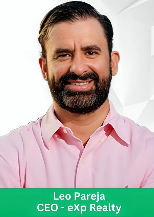Professional portrait of Leo Pareja, CEO of eXp Realty, wearing a pink shirt.
