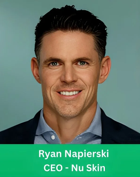 Ryan Napierski, President and CEO of Nu Skin, smiling in a professional headshot with a light blue background.