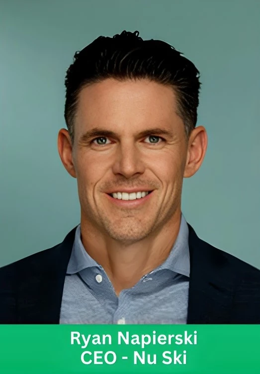 Professional headshot of Ryan Napierski, CEO of Nu Skin, wearing a dark blazer and blue shirt.