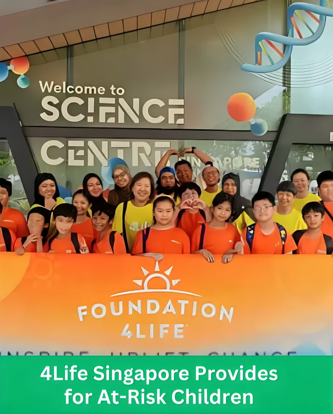 Children and volunteers at Science Centre Singapore during 4Life Singapore’s scientific discovery event for at-risk children