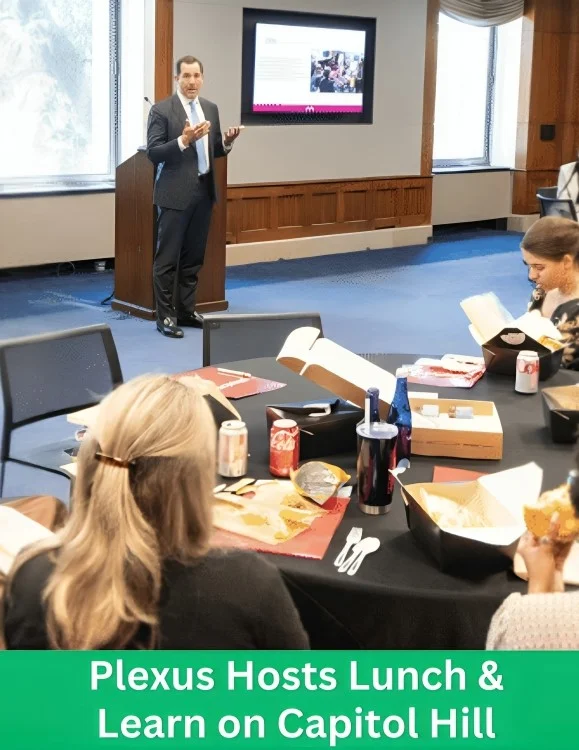 Attendees participate in the Plexus Hosts Lunch & Learn on Capitol Hill event while a speaker presents information during the session.
