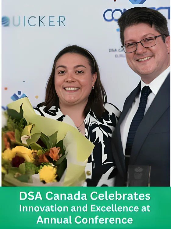 DSA Canada team celebrating innovation and excellence at their annual conference. A woman holding a beautiful flower bouquet stands with a man holding an award in front of the event backdrop.