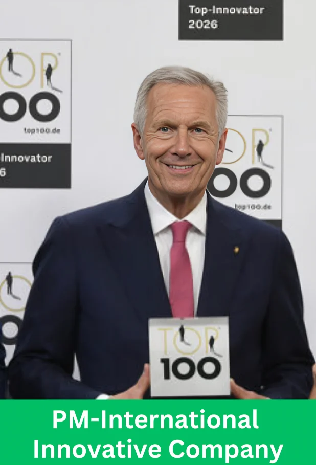 PM-International representative holding the TOP 100 Innovator 2026 award after the company was recognized among Germany's most innovative companies.