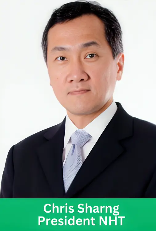 Professional corporate headshot of Chris Sharng, an East Asian man, wearing a black suit and blue patterned tie, with a green panel at the bottom displaying text: "Chris Sharng, President NHT".